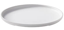 A plain white round plate with a slightly raised edge and a smooth matte finish. Description generated by AI