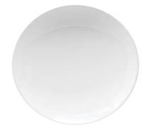 A plain white round ceramic plate with a smooth surface and slightly raised edges. Description generated by AI