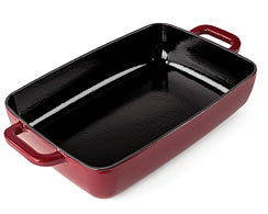 A rectangular red baking dish with black interior and two handles on opposite sides. Description generated by AI