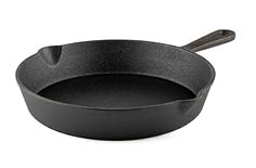 A black cast iron skillet with a handle and two pouring spouts on opposite sides. Description generated by AI