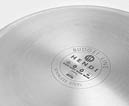 A close-up of the bottom of a stainless steel pan with the brand name Hendi and the words Budget Line and Stainless Steel printed on it. Description generated by AI
