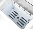 An open white plastic container with ventilation slots and a small handle on one side. Description generated by AI