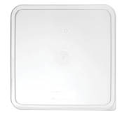 A close-up of a white rectangular object with rounded corners and two small circular indentations near the top center. Description generated by AI